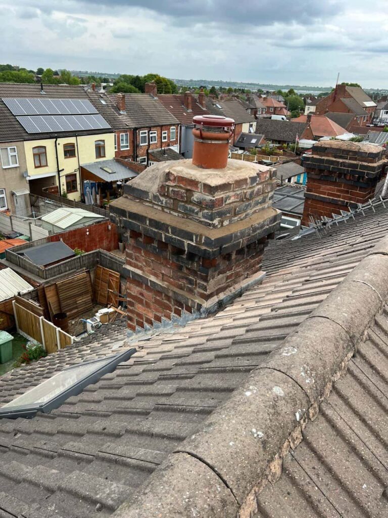 This is a photo taken from a roof which is being repaired by Chatteris Roofing Repairs, it shows a street of houses, and their roofs